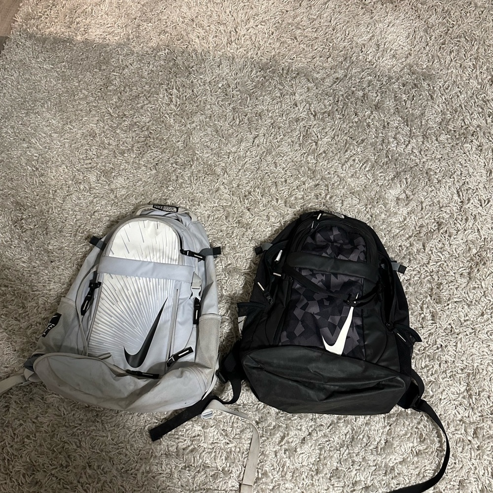 Black and white Nike baseball bags